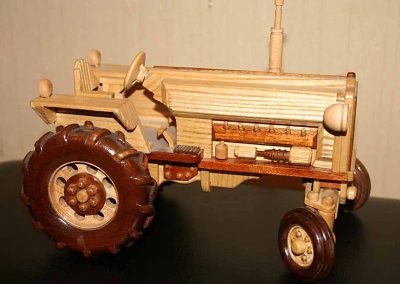 Sunia’s model tractor was made from walnut, maple, cherry, and white ash wood.
