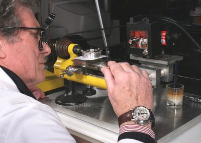 Hartwig at work on a small manual lathe.