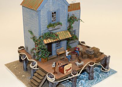 Jeannie Napolitano built this miniature, “Sea Shanty” at a scale of 1/4”:1’.