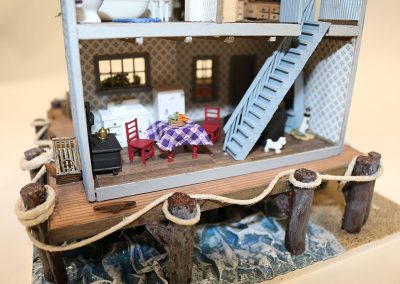 Jeannie Napolitano built this miniature, “Sea Shanty” at a scale of 1/4”:1’.