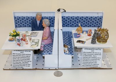 Peggy Boggeln’s 1/12 scale miniature, “Corner Tables” depicts an interesting breakfast scene.