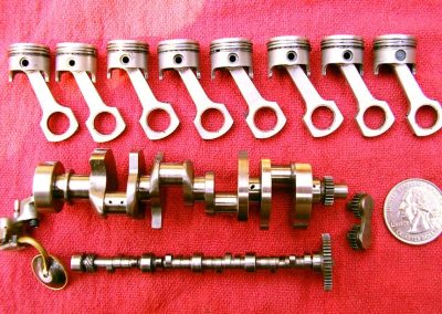 The pistons, rods, crank, and camshaft.