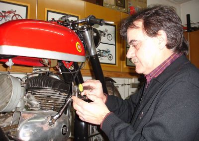 Pere is shown taking some measurements of a full-size Montesa Impala.
