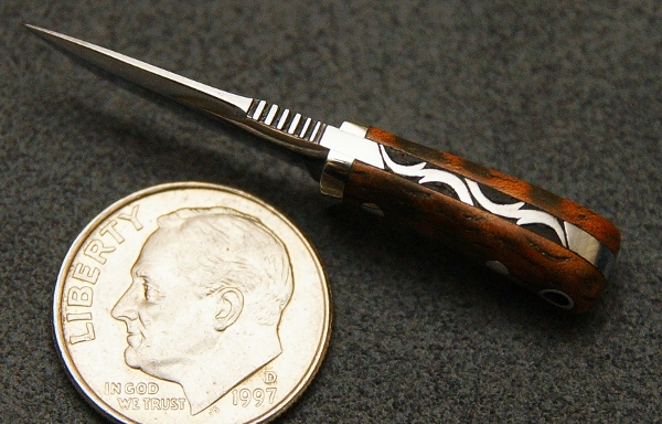 A top view of this micro fixed blade reveals even more intricate detail.