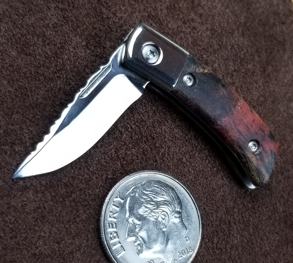 One of Brian's custom made miniature folding knives.