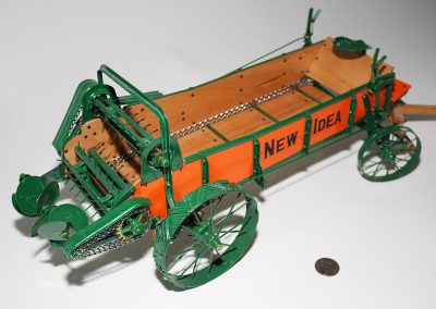 Birk’s scale model of the “New Idea” manure spreader.