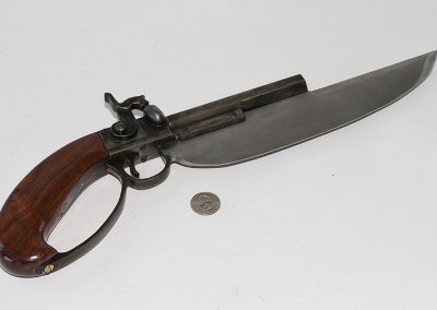 Birk’s full-size Elgin Navy cutlass pistol.