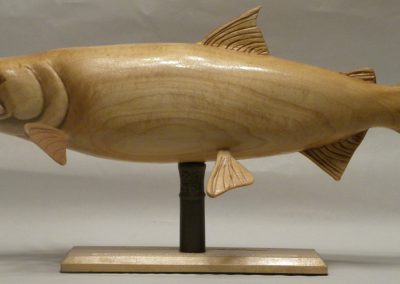 A carved wooden Coho salmon.