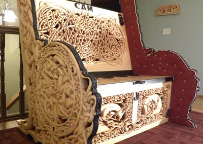 Clayton's custom built carved wooden bench.