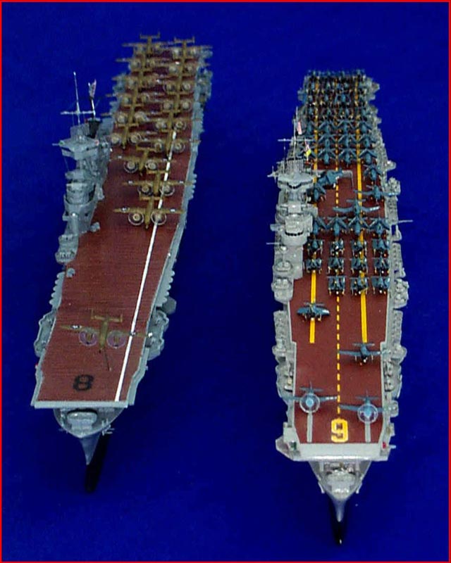 Two of Bill's scale model aircraft carriers loaded with planes. 