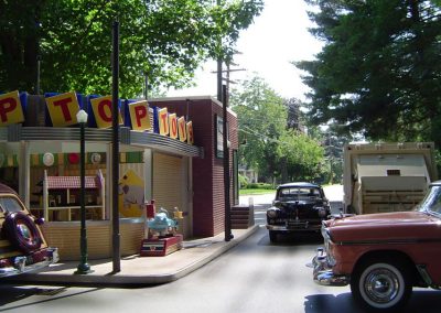 A photo of the Tip Top Toys store during the day.