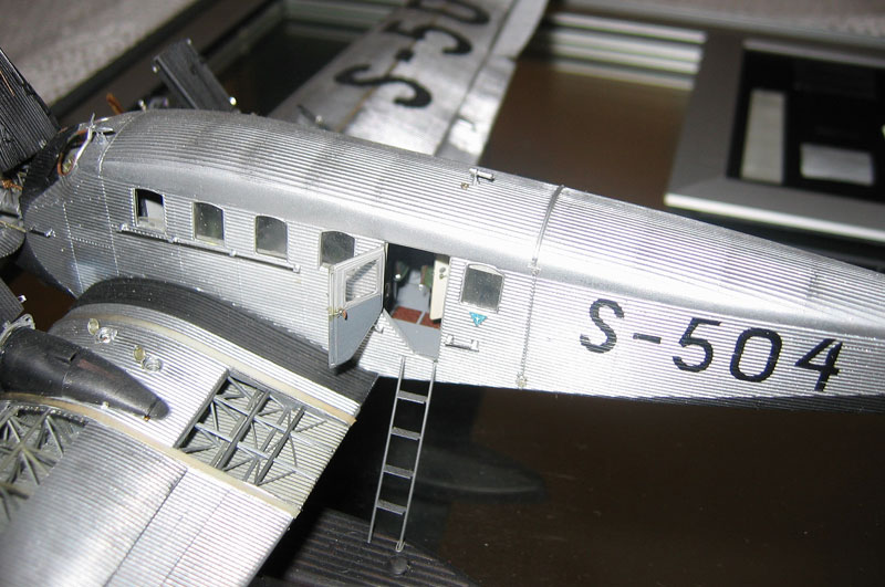 A side view of the Junkers with an open passenger door. 