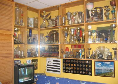 The walls in Andrzej's studio are lined with some of his many award plaques and trophies.