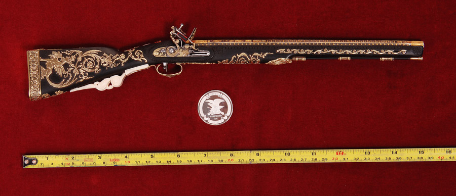 A side view of the miniature carbine.