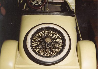 A spare tire is mounted on the trunk of the model Speedster.