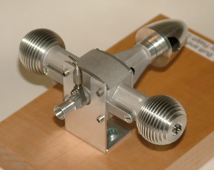 A Cooney Bourke .09 cubic inch 2-cycle model airplane engine.