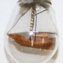 A miniature boat in a bulb. 