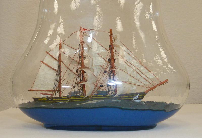 A model sailing ship in a bottle. 