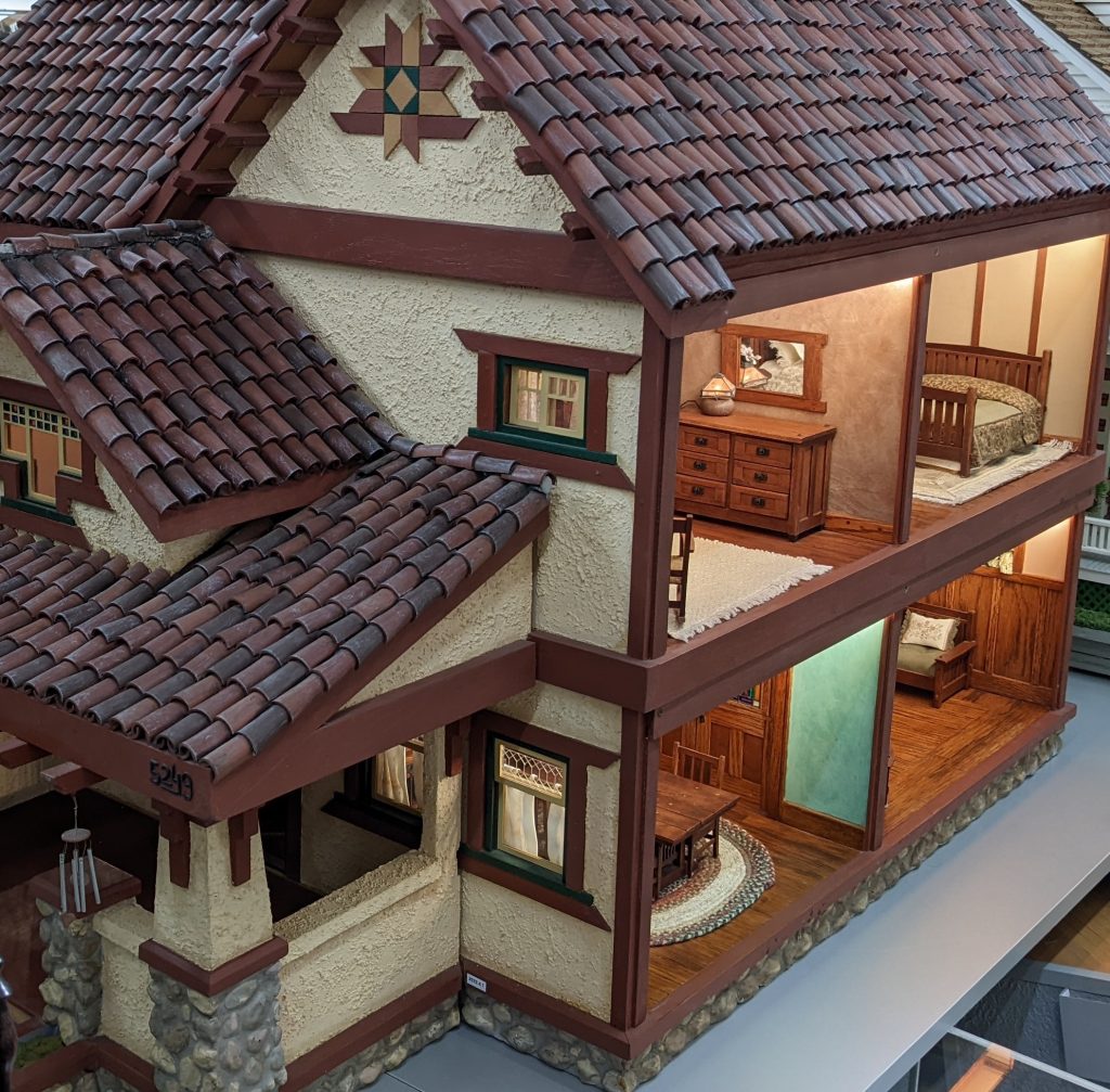 A scratch-built miniature Craftsman style house. 