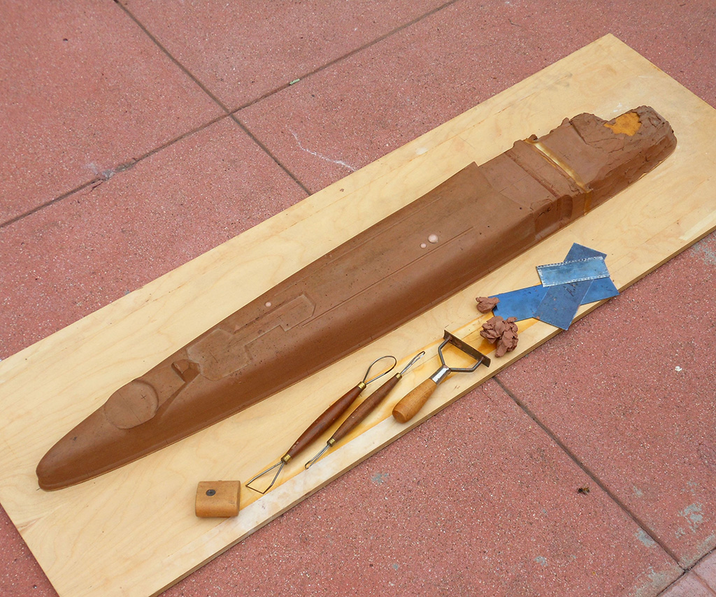 This photo shows the bottom of the fuselage. Some of the stylist's clay modeling tools can be seen as well. 