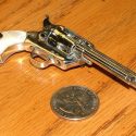 This "Little .45" is a miniature replica of the famous Colt .45 Peacemaker.