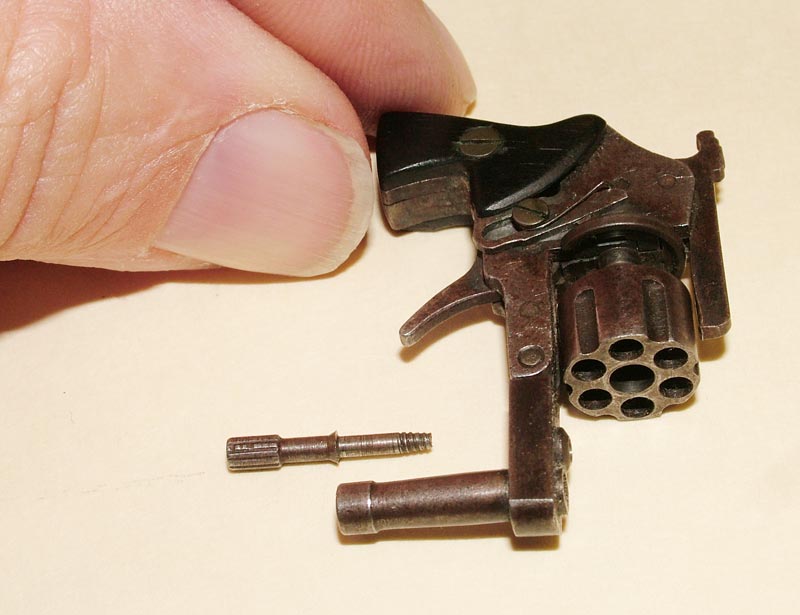 A miniature replica Xythos 2mm Pinfire pistol.