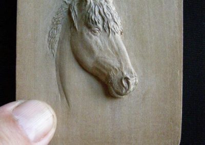 A miniature wood carving made by Vladimir Rusinov.