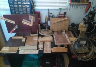 Geoff's workbench covered with pieces of wood for his 1/6 scale Napoleon gun.