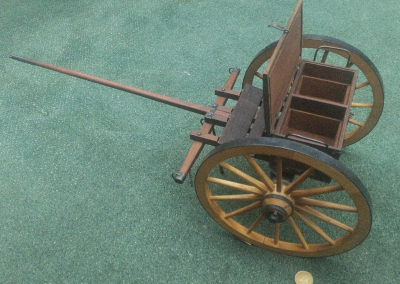 The limber cart is shown here with the ammunition box open.