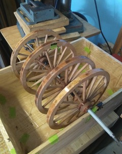 This photo was taken while assembling the wheels for the Napoleon gun and limber. Each unit had two wheels and would be pulled behind a team of six horses.