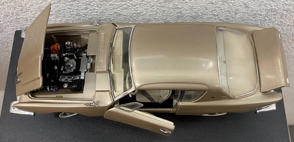 A 1/24 scale model diecast 1963 Studebaker Avanti produced by Franklin Mint.