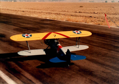 Dan's F4B-2 biplane is shown on the runway.
