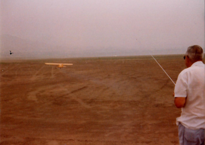 Here Dan is shown flying his R/C model Piper Cub.