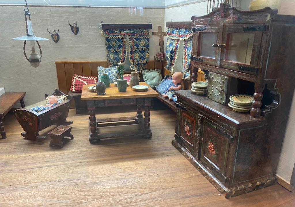 This Bavarian dollhouse with miniature furnishings was built and donated by Linda Winrow.