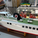 Ellsworth Orr built this scale model of the Caltex Lumba-Lumba boat. The Lumba-Lumba was an all-aluminum vessel built in Erie, Pennsylvania in 1961 for the Caltex Oil Co.